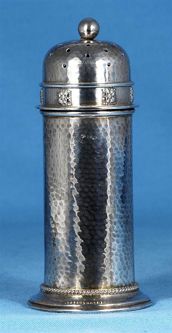 A George V Arts & Crafts silver sugar caster, by Albert Edward Jones, Height 168mm Weight: 5.7oz/180grms